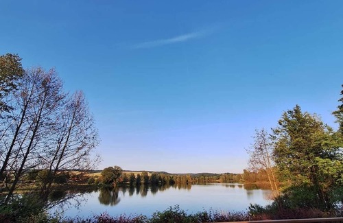 Lauenfoerde Maison | Cozy vacation home with terrace, located directly on a fishing lake.