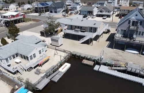 Tuckerton Beach Maison | Cozy waterfront home in an amazing community with pool and hot tub