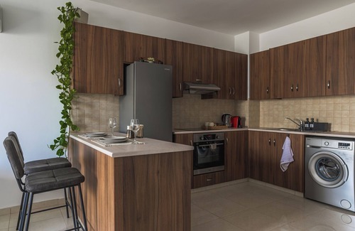 Livadia Appartement | Creative 1BR Pool View Apt with Covered Parking