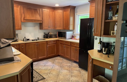 Montoursville Maison | Creekfront getaway with hot tub and fire pit.