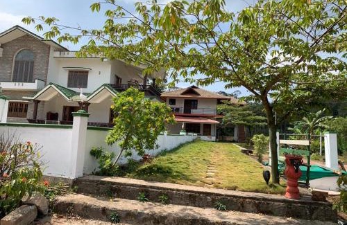 Madikeri Maison | Creekside Cabin