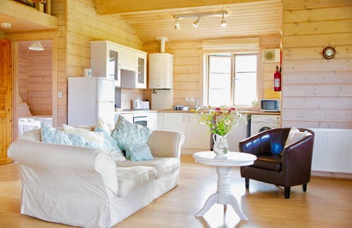 Kirkbean Cottage | Curlew Lodge - un fabuleux et très confortable chalet en bois avec une vue imprenable et woodbur