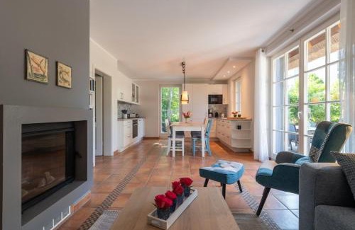 Neuhaus Maison | Dünenhaus Strandlang