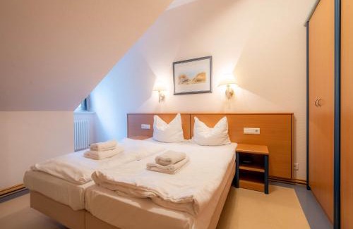 Binz Appartement | Dünenpark Binz - Klassik Ferienwohnung mit 1 Schlafzimmer und Balkon im Dachgeschoss 160