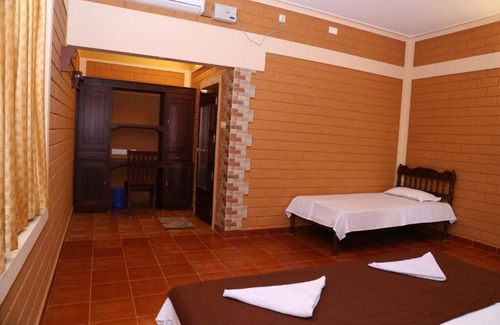 Alappuzha Lit Et Petit-Déjeuner | Dazzle Dew Memories - Deluxe Family Double Room