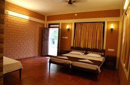 Alappuzha Lit Et Petit-Déjeuner | Dazzle Dew Memories - Deluxe Family Double Room