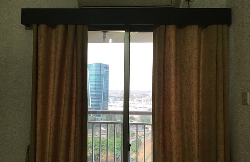 Panunggangan Utara Appartement | Deluxe 2BR Apt avec Vue sur la Ville - 1715 GWR