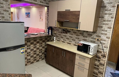 Al-'Umraniyah Lit Et Petit-Déjeuner | Deluxe Pyramids view apartment