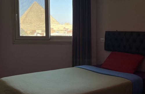 Al-'Umraniyah Lit Et Petit-Déjeuner | Deluxe Pyramids view apartment