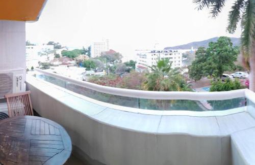 Caleta Appartement | Departamento con vista al mar, albercas y juegos