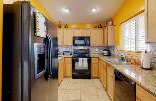 Power Ranch Maison | Desert oasis with an enclosed yard, firepit, washer/dryer, and central AC