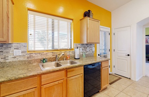 Power Ranch Maison | Desert oasis with an enclosed yard, firepit, washer/dryer, and central AC
