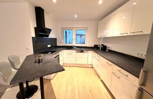 Sinsheim Appartement | Designer Apartment in Sinsheim Erstbezug 75 TV mit Netflix und offene Küche WeHome Premium