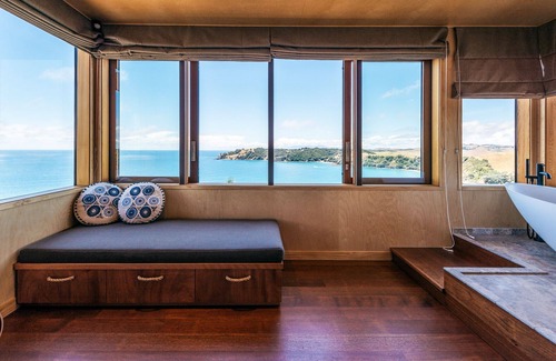 Waiheke Island Maison | Designer living with stunning views across the bay, a spa and coast walks.