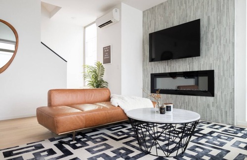 Atlantic Maison | Designer Urban Retreat w/ Rooftop Deck & Fireplace