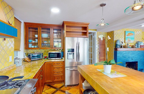 Historic District Maison | Dog-friendly riverfront home with dock, 2 balconies, waterside patio, & grill
