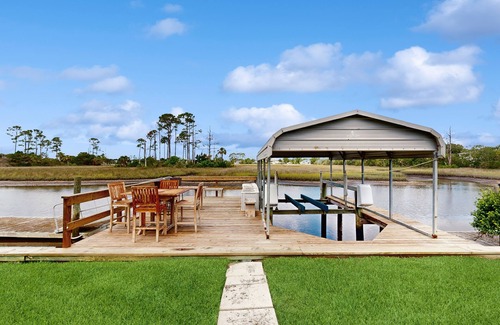 Isle of Palms Maison | Dog-friendly waterfront home with private dock, boat lift, pool and spa