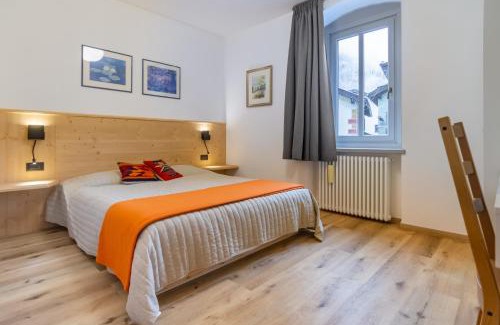 Predazzo Appartement | DolomiApartments - Appartamenti Campanil 1 e Campanil 2