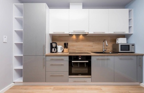 Kolczewo Maison | Appartement Posejdon C au sous-sol avec 1 chambre à coucher, jacuzzi et sauna