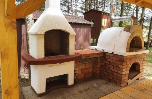 Rybno Cabine | Domek nad jeziorem Rumian