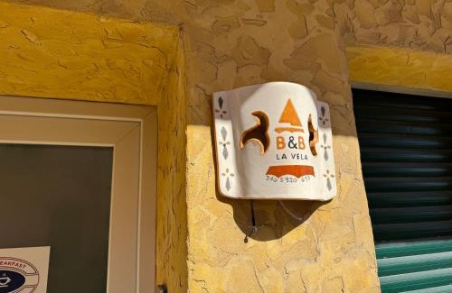 Sant'Antioco Maison | Domo La Vela - Affittacamere - Living Sant'Antioco