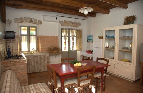 San Giovanni Suergiu Maison | Domusantiga Apartments 2 DOUBLE BEDROOMS, GREEN MEADOW, by the sea