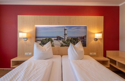 Sudstadt Maison | Doppelzimmer mit Balkon - Das Hotel an der Stadthalle Rostock