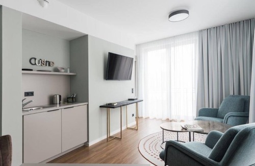 Bad Saarow Appartement | Doppelzimmer Terrasse, Dusche / WC - Velotel Bad Saarow