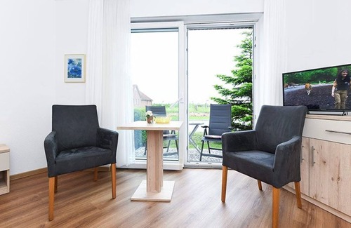 Neuharlingersiel Cottage | Double room with balcony or terrace - Double room in the Hotel-Pension Marlies