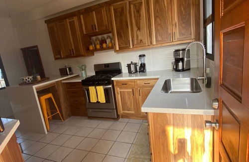 Dangriga Appartement | Downtown Dangriga! Style and comfort with a pool. Maya Mountains and sea views.