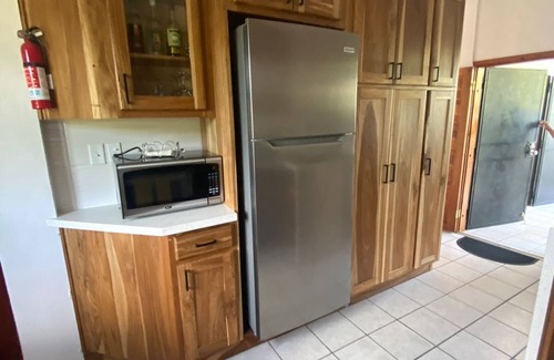 Dangriga Appartement | Downtown Dangriga! Style and comfort with a pool. Maya Mountains and sea views.