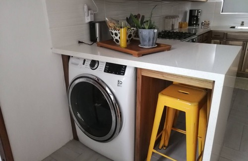 Dangriga Appartement | Downtown Dangriga! Style and comfort with a pool. Maya Mountains and sea views.