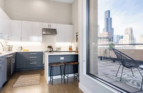Printers Row Copropriété | Downtown Penthouse 5bd - Parking, Gym, Pool, VIEWS