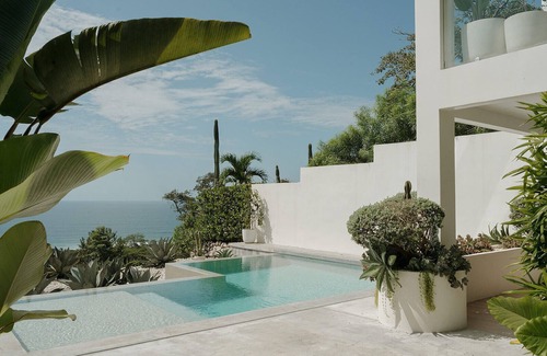 Playa Hermosa Cobano Appartement | Dreamy King Bedroom Ocean view suite at Sky House Santa Teresa