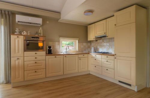 Erm Chalet De Ski | Drents Genieten - Goudheide met privé jacuzzi & sauna