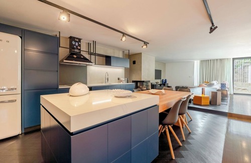 Paredes Maison | Dual Villas, Pool and Gym Retreat by HostWise