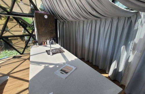 Waiatarua Cabine | Dusk&Dawn Glass dome glamping accommodation in the bush near Auckland