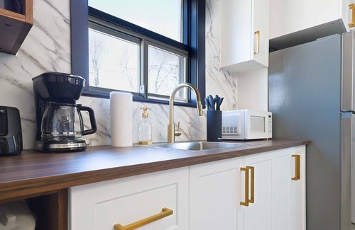 Maizerets Appartement | Ebony | Élégance urbaine | Condo cozy au cœur de Québec