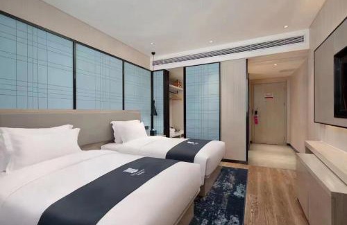 Qingshan Hôtel | Echarm Hotel Wuhan High-speed Rail Peace Park Metro Station