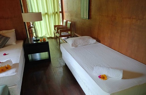 Sigiriya Station Balnéaire | Eco-friendly Eighth Wonder lodge bedroom resort with AC, Wi-Fi in Sigiriya