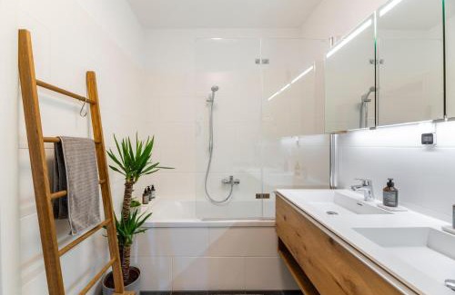Graz-Straßgang Appartement | EDLER WOHNRAUM Panoramablick 3 SZ Boxspringbetten, E-Ladestation, Kaffeevollautomat, Klima, Lift, Terrasse & 2xTG