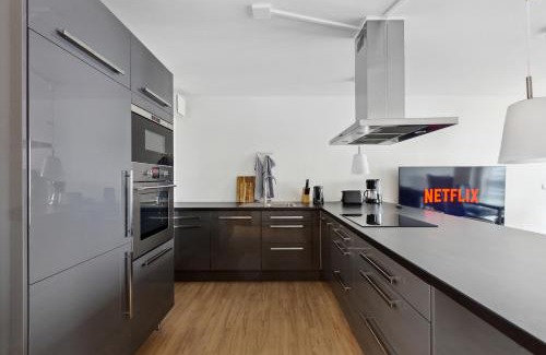 Suedwest Appartement | Eindrucksvolle Zwei-Zimmer-Wohnung mit Balkon und großer Küche