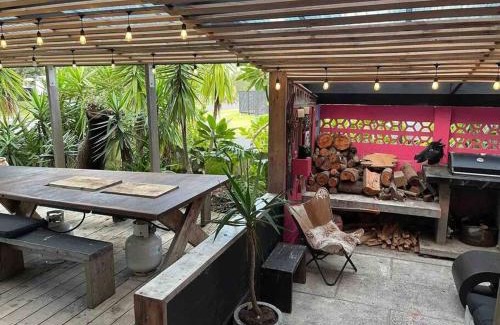 Bowentown Maison | Electric Waihi Beach House - family & dog friendly, close to beach, pool table, outdoor fire room, skate ramp