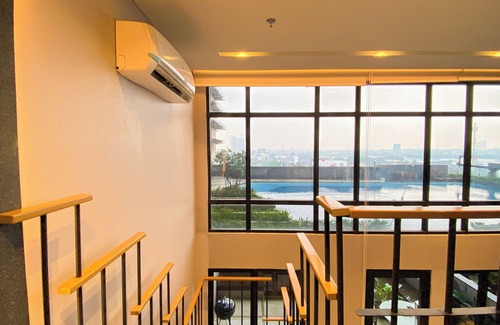 Pinang Appartement | Elegant 2BR Loft Garden Villa at Collins Boulevard Apartment
