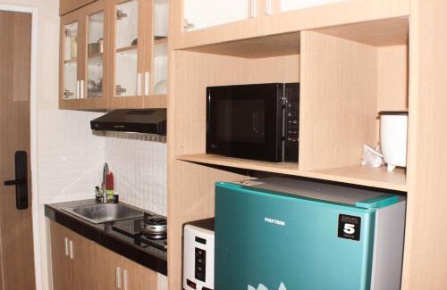 Jakarta Appartement | Elegant and Strategic Loft Studio Apple 1 Condovilla Apartment By Travelio