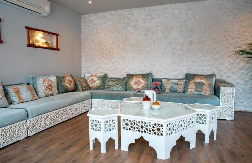 Umm Salal Villa | Elegant Garden Stay with 2 Living Areas, 2 Bedrooms, 1 Full and 1 Half Bath for 6 Guests