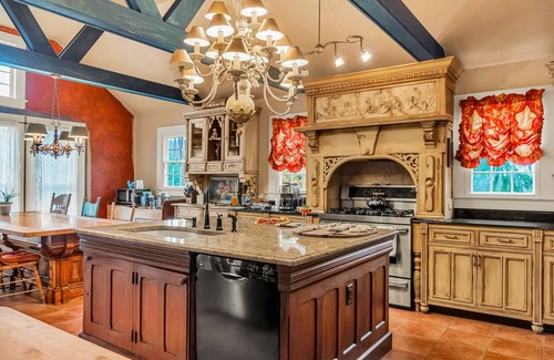 Franklin Springs Autre | Elegant home with two living areas, a furnished patio, & wood fireplace