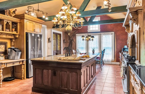 Franklin Springs Autre | Elegant home with two living areas, a furnished patio, & wood fireplace