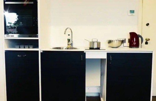 Carrobbio Appartement | Elegant loft with cathedral terrace and park view
