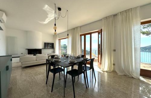 Portovenere Appartement | Elegant modern and bright flat with splendid terrace overlooking the sea and Palmaria Island Modern designer interior accommodates up to six people